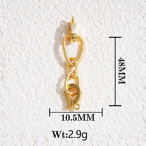 Detailed view of golden 18K brass jewelry clasp with 48mm length and CZ stone inlay