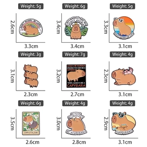 Collection of nine cartoon capybara enamel pins with creative animal designs and motifs