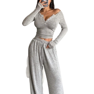Grey 2-piece lounge set with long-sleeved buttoned top and high waist wide leg pants
