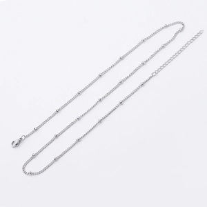 2mm stainless steel beaded satellite chain necklace with lobster clasp on white background