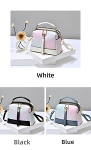 Close-up of stylish gradient leather handbags with white, black, and blue trim options