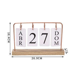 Detailed view of wooden desk calendar with rose gold metal frame and size dimensions