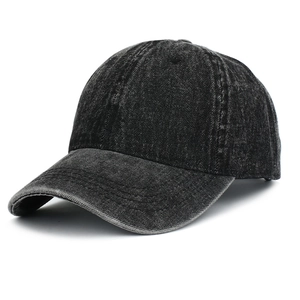 Detail view of washed black denim baseball cap with vintage distressed texture and stitching