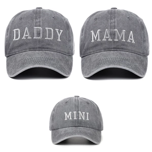 Close-up of DADDY MAMA and MINI embroidery on washed cotton vintage baseball caps