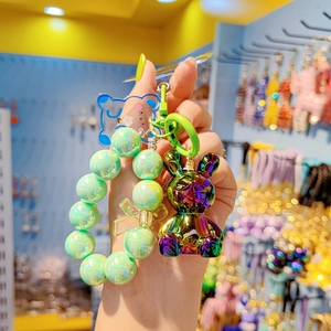 Colorful beaded phone charms with butterfly bow and bear pendant in candy colors