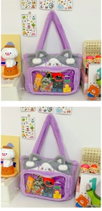 Detail view of purple plush tote bag with cat ears and transparent window display