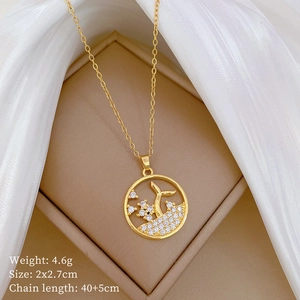 Detailed view of gold fishtail necklace with full crystals and product size specifications