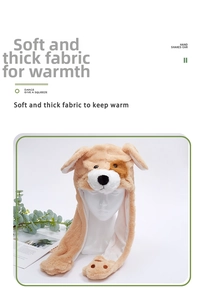 Detail of plush dog hat with moving long ears and pink paw-shaped squeeze air pumps