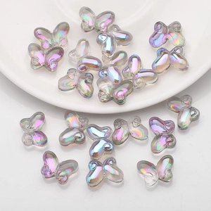 Detailed macro view of 10x14mm iridescent glass butterfly beads for DIY jewelry making