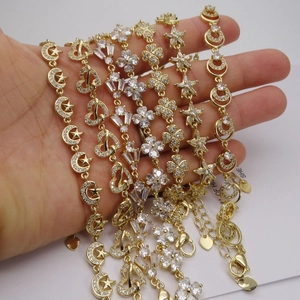 Gold-plated zircon bracelets featuring heart, moon, and flower charms with adjustable clasps