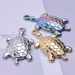 Detailed trio of turtle charms in gold, silver and rainbow finishes for jewelry making