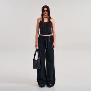Streetwear cotton wide-leg joggers and tank top set shown in a professional studio view