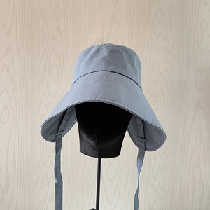 Blue-grey wide-brim sun hat for women featuring long chin straps for outdoor sun protection