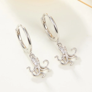 Exquisite S925 sterling silver octopus hoop earrings featuring shimmering zircon pave stones