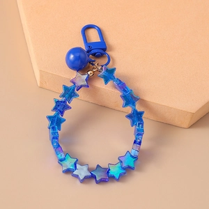 Close-up of blue star-shaped beaded keychain with a round pendant and metal clasp