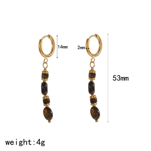 Detail view of gold hoop earrings with brown resin beads and 53mm length dimensions
