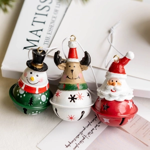 Metal Christmas bell ornaments featuring Santa, Snowman, and Reindeer figurines