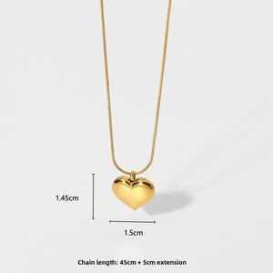 Detail of gold heart pendant 1.5cm by 1.45cm with a 45cm adjustable snake chain