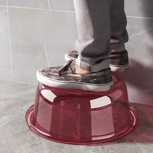 Strong translucent red plastic washbasin demonstrating high load-bearing and durability