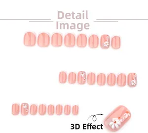 Detail of 3D white daisy flowers on short square pink translucent press-on nails