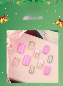Detail of pink 3D Christmas press-on nails with silver glitter and sweater texture