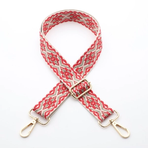 Adjustable wide canvas shoulder strap with red and grey geometric patterns and gold clips