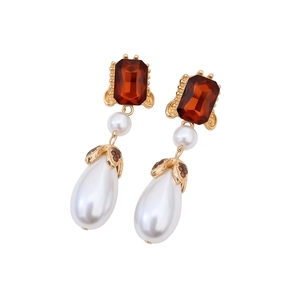 Vintage gold-toned drop earrings featuring crystal stones and elegant water-drop pearls