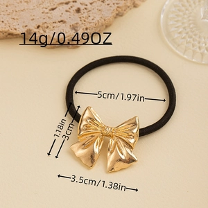 Detail showing dimensions of golden metal bow hair tie with high elastic black band