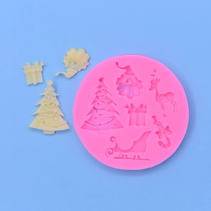 Pink Christmas silicone mold with Santa, Reindeer and Tree patterns for DIY crafts