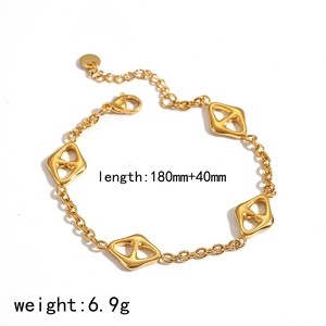 Detail of 18k gold plated chain bracelet featuring four hollow rhombus charms on white background