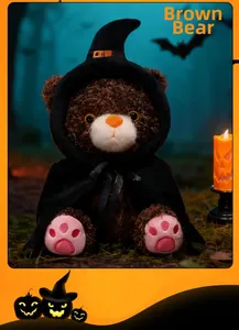 Detail of Halloween brown teddy bear in wizard hat and cape with glowing pumpkin background