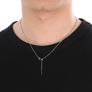 Detail of adjustable silver Y-chain necklace featuring a sliding bead on a minimalist link