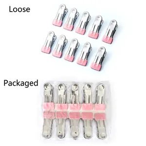 Set of 10 stainless steel clothes pegs with pink non-slip rubber tips for secure drying