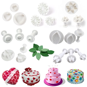 33-piece fondant cake cutter set with assorted shapes like snowflakes and butterflies