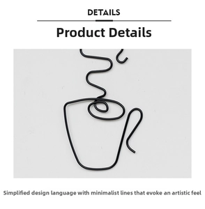 Minimalist black wire wall art detail featuring a coffee cup silhouette and steam lines