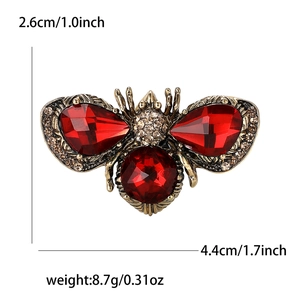 Exquisite rhinestone bee brooch in antique gold finish with red gemstones and dimensions
