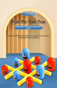 Detail showing colorful nested monster pieces on a tic-tac-toe game board