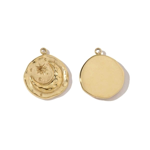 Detailed view showing front and back of golden crescent moon and star pendant charms
