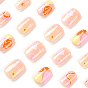 Pink heart and smiley face press-on nails with floral patterns in short square shape