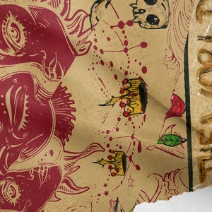 Macro shot of bohemian tapestry fabric showing detailed skull print and textile texture