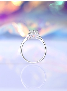 Macro shot of S925 sterling silver halo ring with a round moissanite center stone