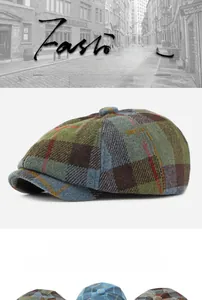 Detail of wool octagonal newsboy cap showing plaid pattern and elastic inner band
