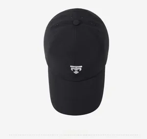 Top down view of black breathable baseball cap with laser-cut mesh holes and logo