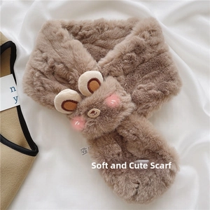 Detail view of brown plush bear scarf with soft faux fur texture and embroidery