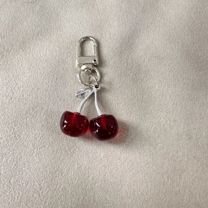 Sparkling red cherry keychain with silver leaves and glitter resin fruit pendant