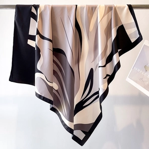 Silk-satin twill scarf with abstract leaf print and stripes in black and beige tones