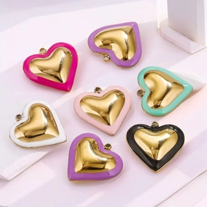 Colorful heart-shaped stainless steel charms with gold finish and enamel borders for DIY jewelry