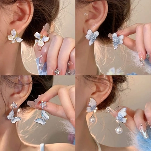 Blue crystal butterfly and flower stud earrings set with rhinestones and pearls