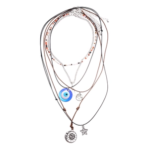 6-piece bohemian layered necklace set with evil eye sun and star pendants