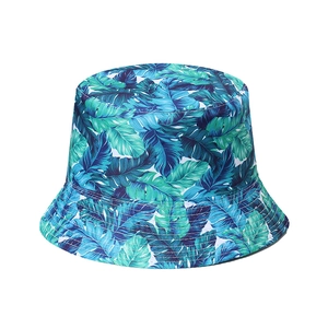 Tropical palm leaf bucket hat in blue and teal tones for summer outdoor sun protection